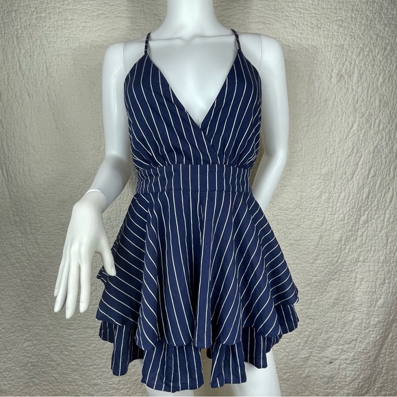 🔥Lulus Ruffle & Flow Black Striped Backless Ruffle
Romper Blue White - Picture 4 of 16